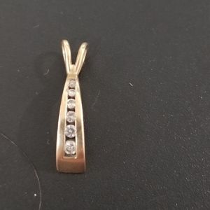Gold and diamond pendant